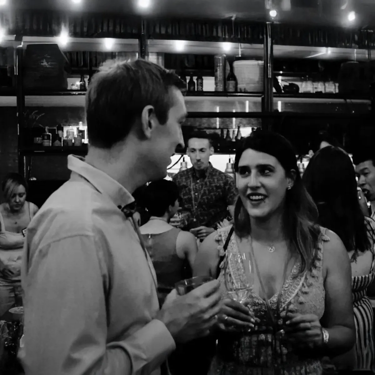 Two guests in conversation at an Offline Valentine event