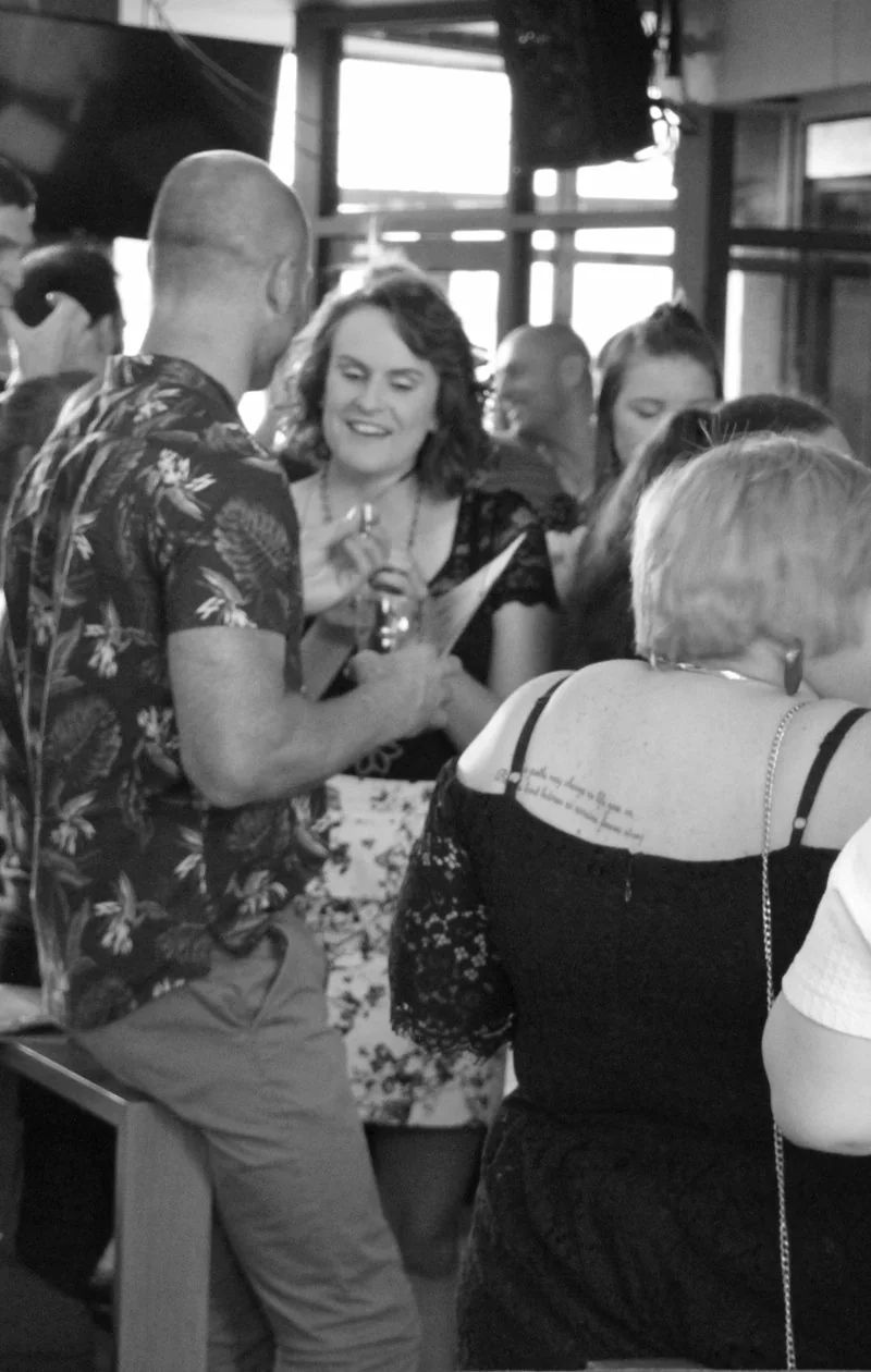 Guests mingling and chatting after the 36 Questions
