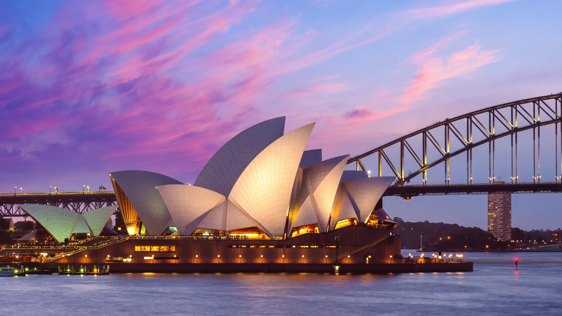 Sydney Opera House and Harbour Bridge at sunset